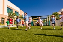 Photo of Children Running and Playing
